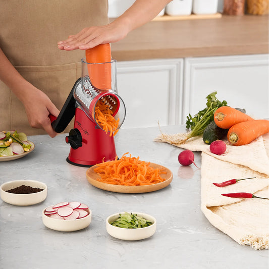 Hand using Geedel Rotary Cheese Grater to create colorful shredded vegetables for gut-healthy meals in 2026.