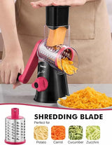 Black and rosy Geedel rotary cheese grater using the coarse shredding blade for shredded cheese and vegetables.