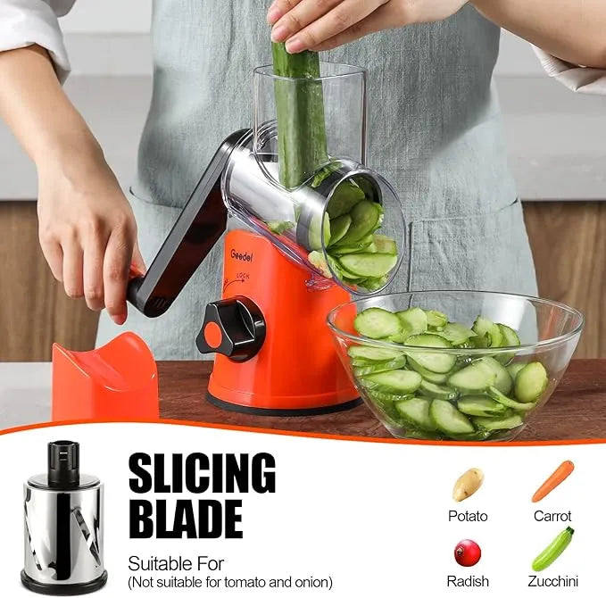 Orange and black Geedel rotary cheese grater slicing vegetables with the slicing blade for easy salad and meal prep.